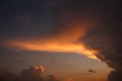 Low angle view of dramatic sky during sunset