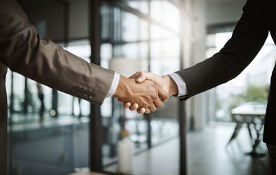 Business colleagues shaking hands