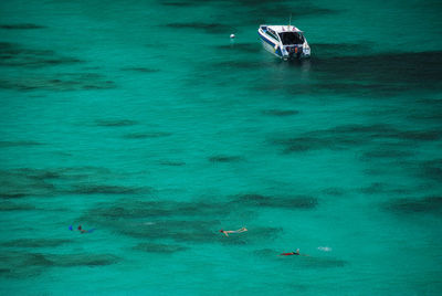 Boats sailing in sea