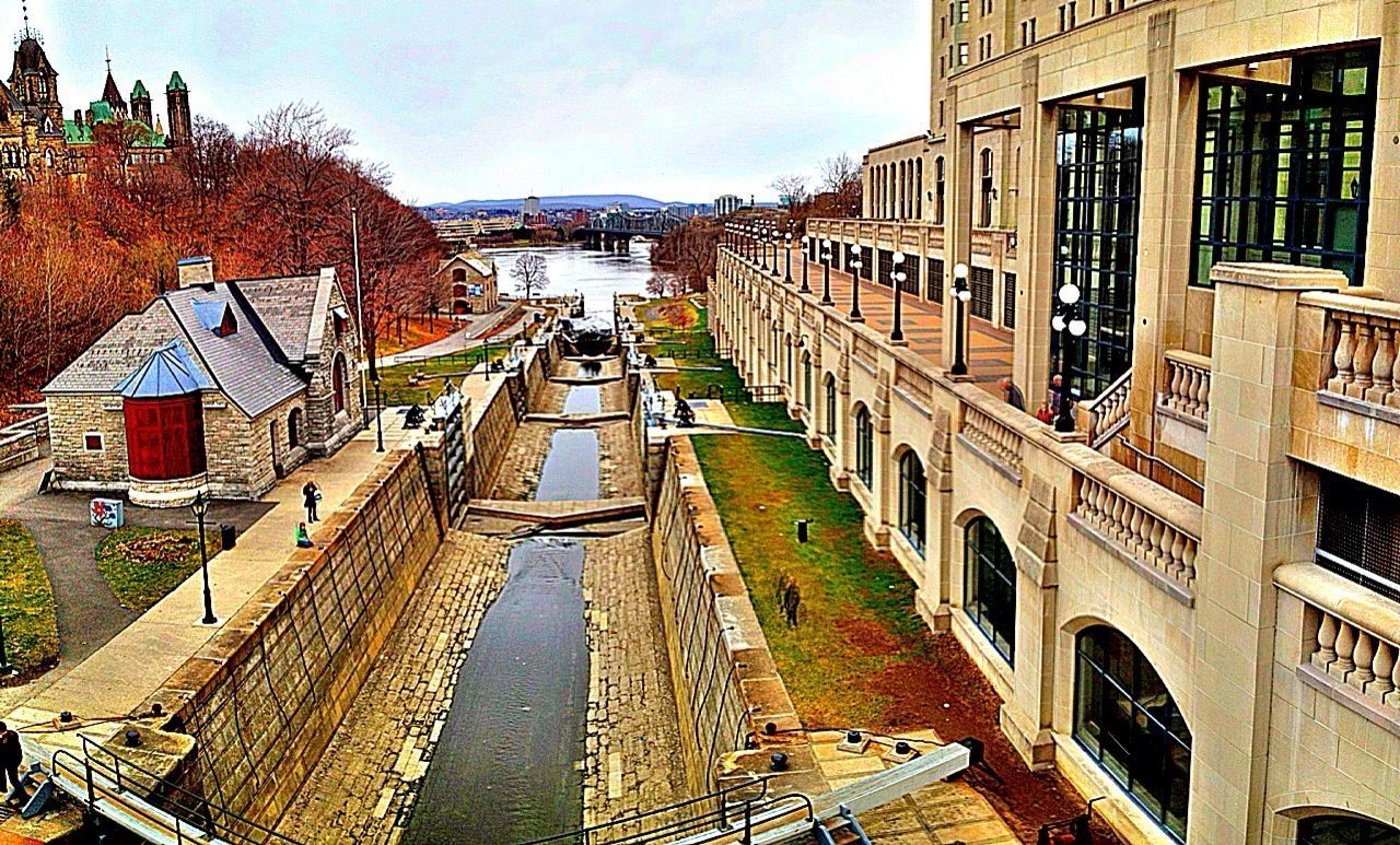 VIEW OF CANAL AMIDST BUILDINGS