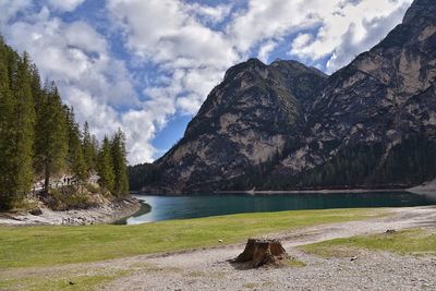 Scenic view of lake and mountains against sky