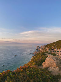 Scenic view of sea against sky during sunset