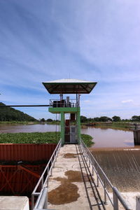 Gazebo by building against sky