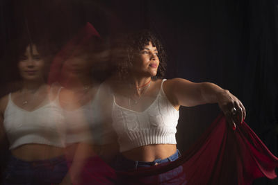 Time lapse view of woman moving a rag. long exposure, motion blur. 