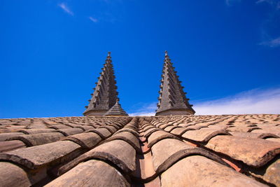 Low angle view of building against blue sky