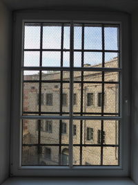 Building seen through glass window