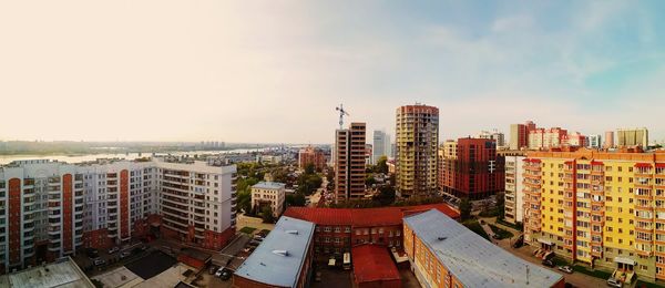 Aerial view of cityscape against sky