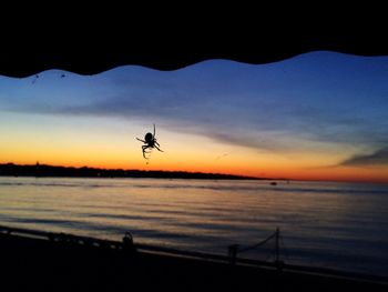 Scenic view of sea at sunset