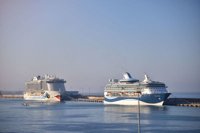 Ship in sea against clear sky