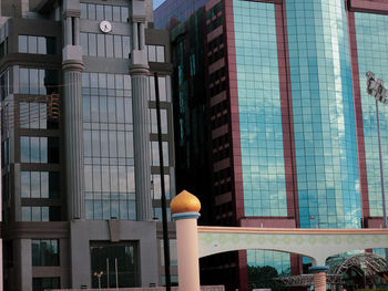 Reflection of building on glass window