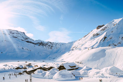 Snow covered mountains against sky