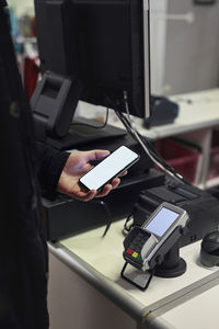 Man paying in department store