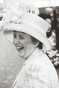 Close-up of woman wearing hat