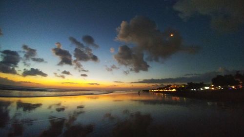 Scenic view of sea against sky at night