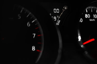 Close-up of clock in car