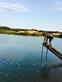 Man on diving platform