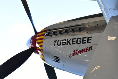 Low angle view of airplane against clear sky