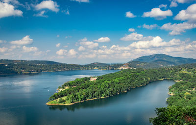 Serene lake with mountain background at day from top angle