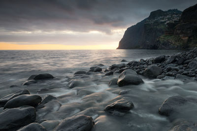 Scenic view of sea against sky during sunset