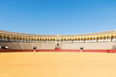 View of historical building against clear blue sky