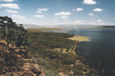 Scenic view of landscape and mountains against sky