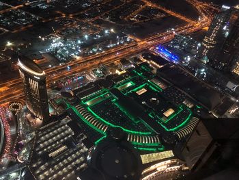 High angle view of illuminated cityscape at night