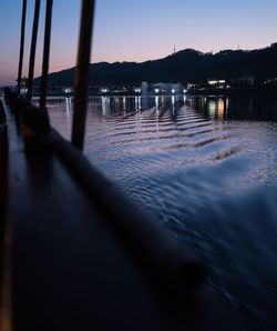 Scenic view of river against sky at sunset