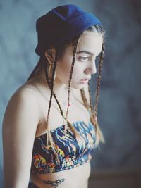 Portrait of a young woman looking away