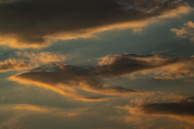 Low angle view of dramatic sky during sunset