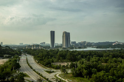 Panoramic view of city and buildings against sky