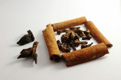 Close-up of food on table against white background