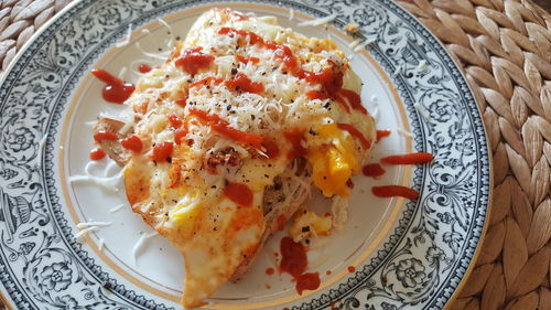 High angle view of breakfast in plate on table