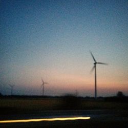 Wind turbines on field