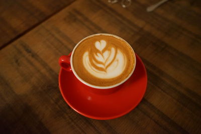 High angle view of cappuccino on table