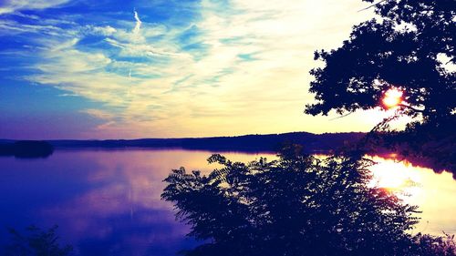 Scenic view of lake at sunset