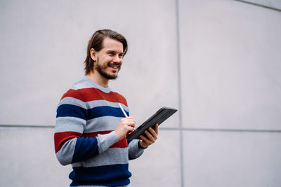 Young man using mobile phone