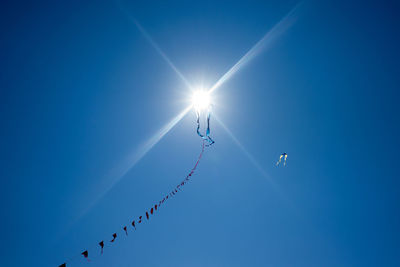 Low angle view of kite in sky