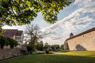View of medieval town with city wall in park