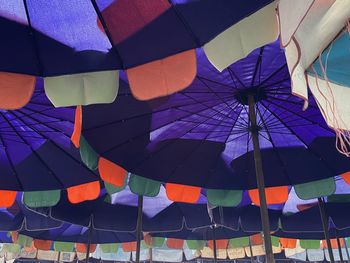 Low angle view of multi colored umbrella