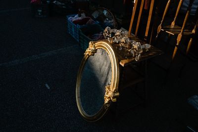 High angle view of mirror on table in darkroom