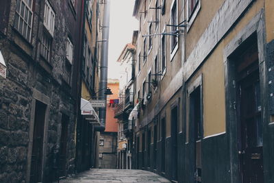 Narrow alley along buildings