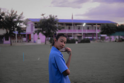 Portrait of girl standing on beach