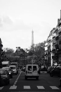City street against cloudy sky