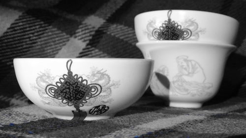 Close-up of coffee cup on table