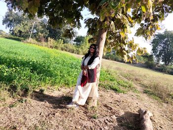 Full length of man standing on field