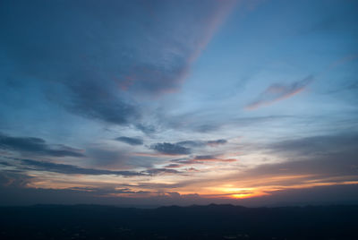 Scenic view of dramatic sky during sunset