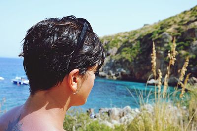 Portrait of man in sea against sky