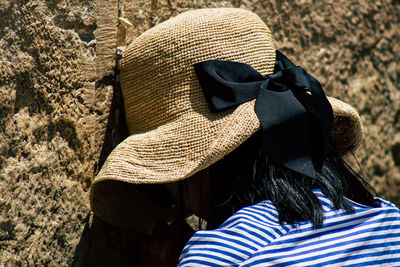 Rear view of woman wearing hat