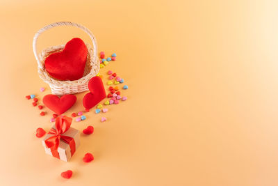 Big red heart in basket with gift box for valentine day background