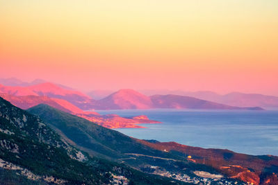 Scenic view of mountains against sky during sunset